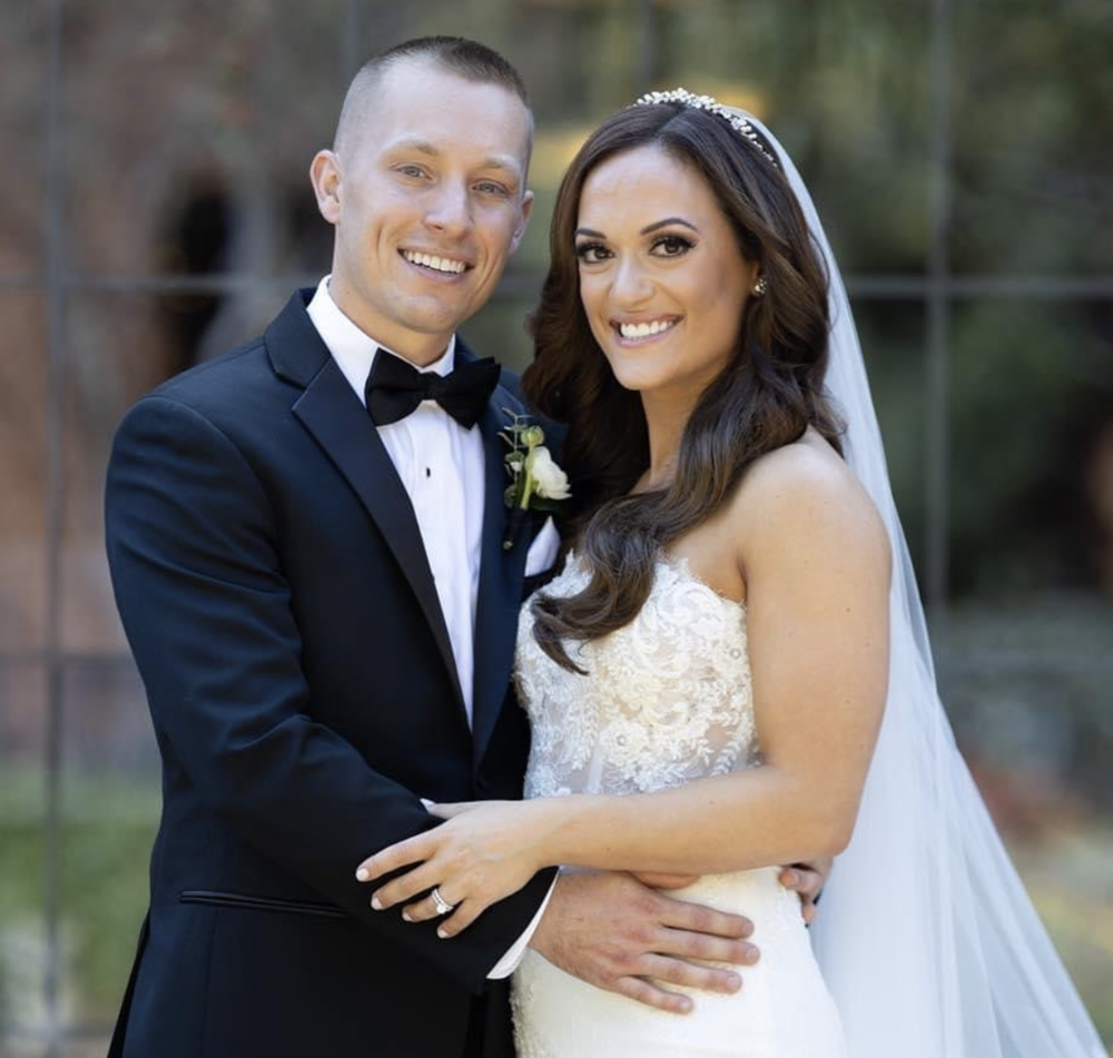 Patient showcasing a flawless look after receiving professional makeup service.